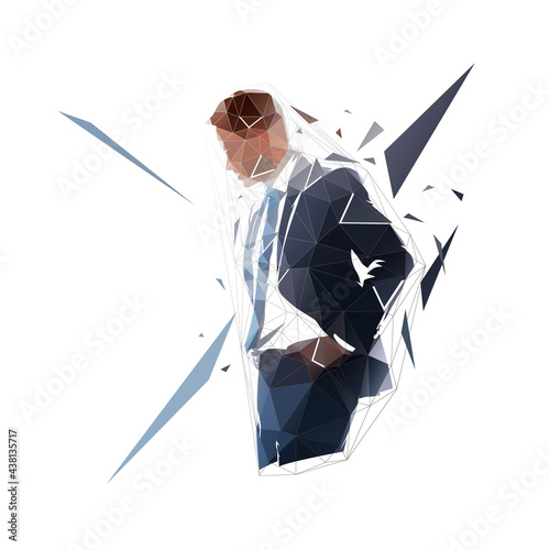 Thinking businessman, low polygonal vector illustration. Isolated geometric illustration. Man in suit with hands in pockets, side view