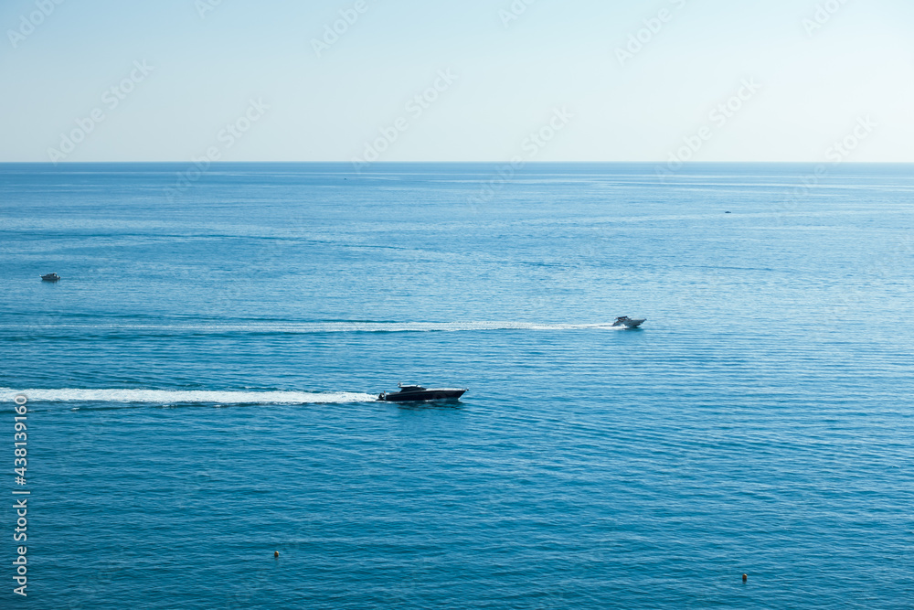 Obraz premium Nature scenic landscape with luxury sailing yacht. Beautiful mediterranean sea in sunny summer day. Perfect tourist place for sailing. Tourist on summer holiday vacation trip. High quality photo