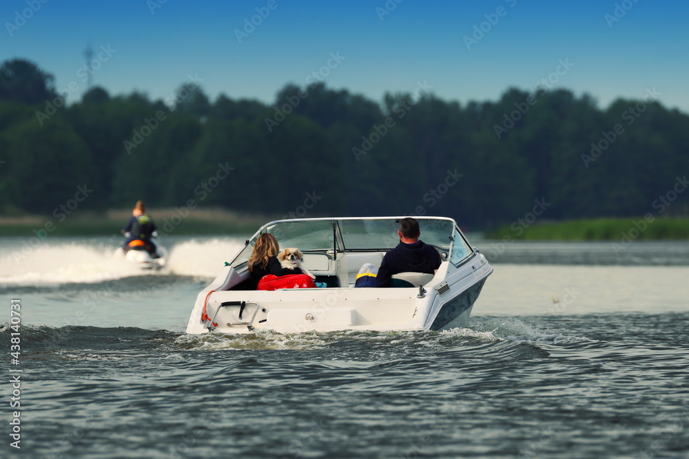 boat on the river, fast motorboat, recreation on the river,water scooter - obrazy, fototapety, plakaty 