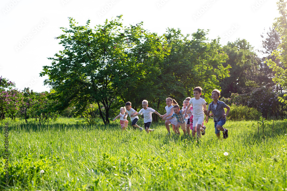 children play outdoors running and having fun children play outdoors running and having fun