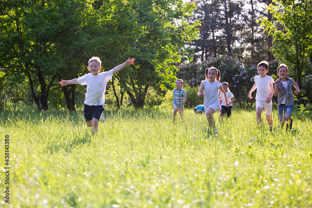 children play outdoors running and having fun children play outdoors running and having fun