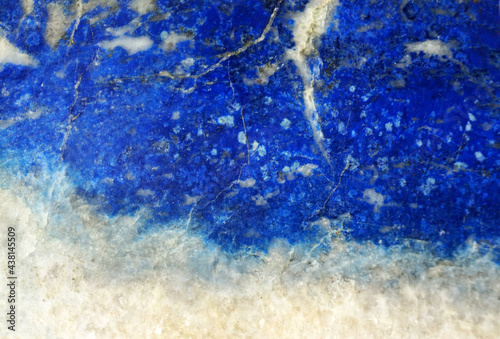 lapis lazuli natural background closeup, blue texture for design photo