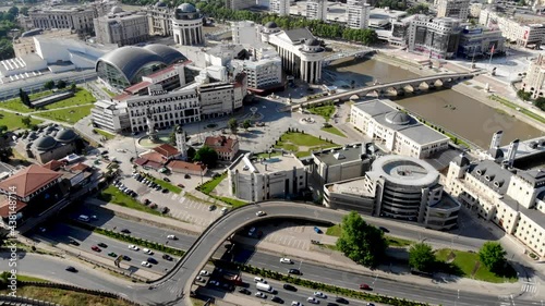 A panoramic drone view of the city of Skopje in northern Macedonia. Drone view of the stone bridge over the Vardar River. The central square in Skopje from above. photo