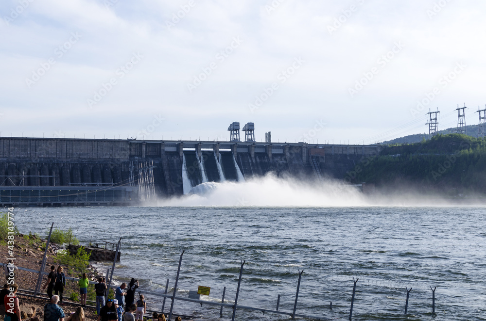 Discharge of excess water from floodgates during flooding. Discharge of excess water at hydroelectric power plants Discharge of excess water from floodgates during flooding. Discharge of excess water at hydroelectric power plants