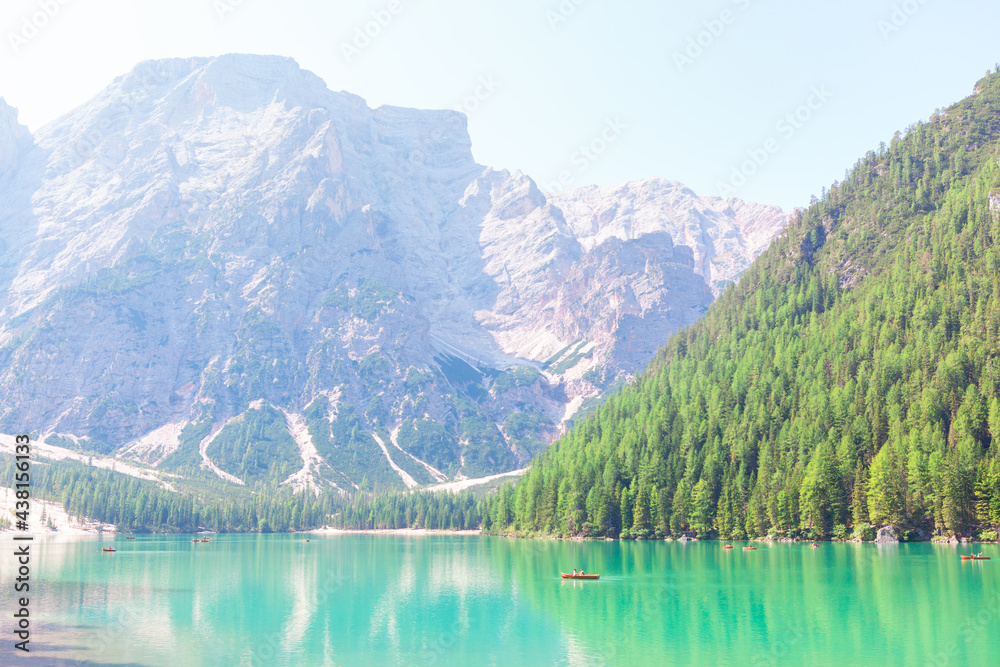 Lago di Braies is located in Braies Valley . Alps lake and coniferous forest . Boats on the  Pragser Wildsee 