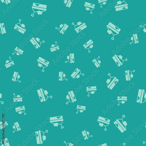 Green Sandbox with sand icon isolated seamless pattern on green background. Vector