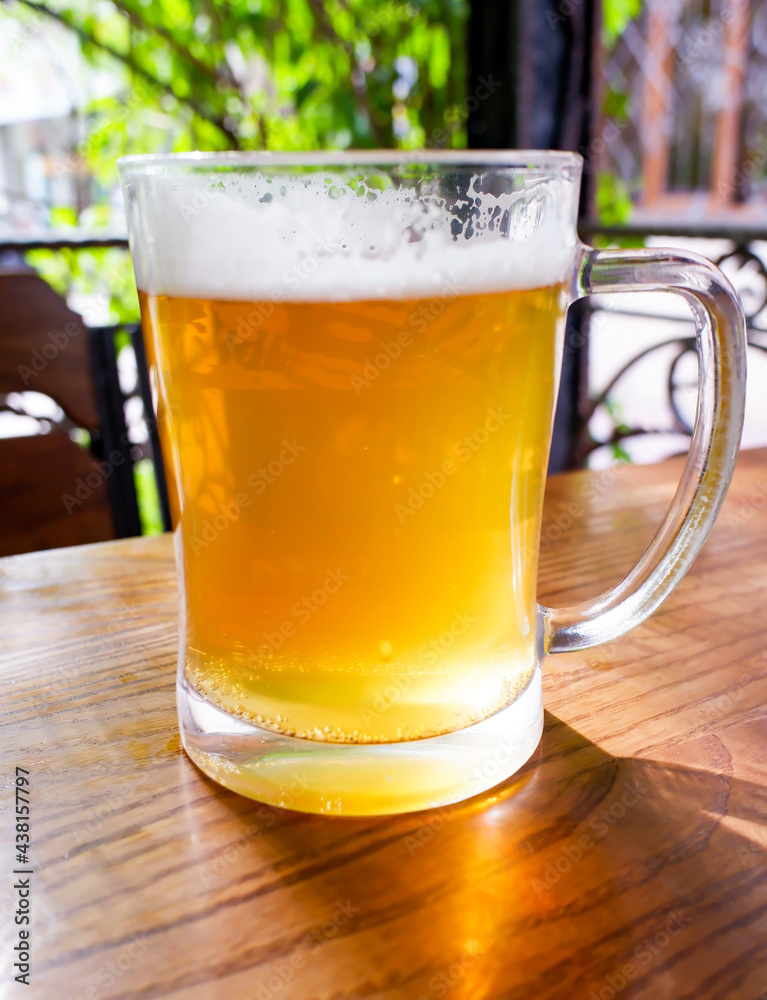 a mug of beer on the summer veranda a mug of beer on the summer veranda