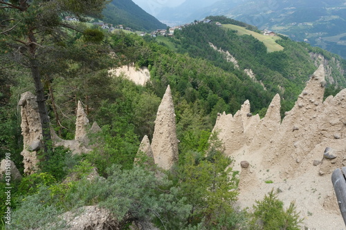 The incredible earth pyramids of Collepietra (Piramidi di Terra) in the Dolomites. Striking place. Italian Alps. Sunny spring day. Trentino Alto Adige. photo