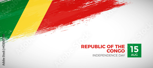 Happy independence day of Republic of the Congo with brush painted grunge flag background