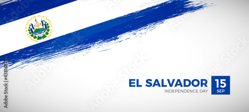 Happy independence day of El Salvador with brush painted grunge flag background