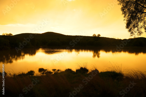 Golden hour sunset over the river