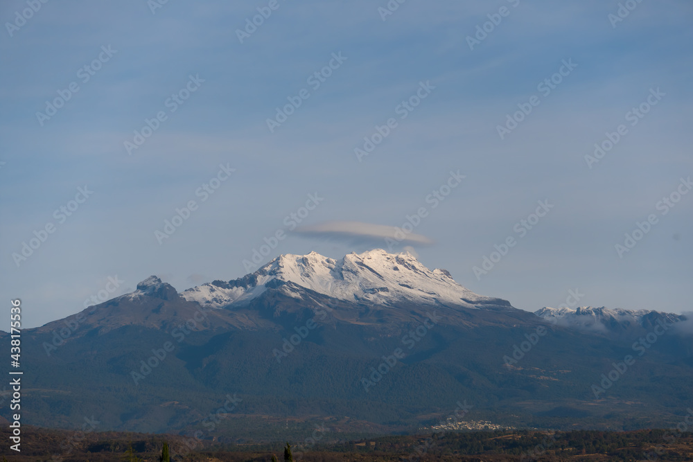 A mesmerizing view of Iztaccihuatl volcanic mountain in Mexico A mesmerizing view of Iztaccihuatl volcanic mountain in Mexico