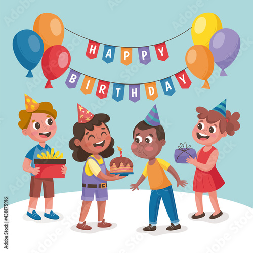 Kids celebrating a birthday party. Little black boy blowing out the candles. Happy children with gifts smiling and celebrating.