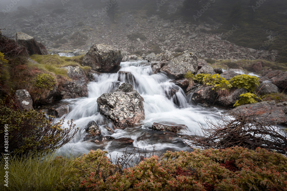 Long exposure shot, waterfall - Pyrénées - Occitanie - Ariege - France Long exposure shot, waterfall - Pyrénées - Occitanie - Ariege - France