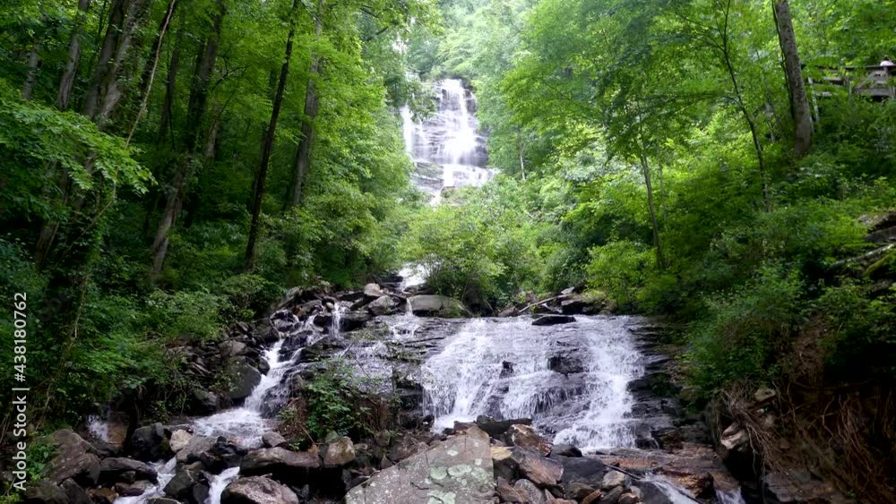 Georgia Amicalola Falls Spring A full view of Amicacola Falls from the bottom through the trees Georgia Amicalola Falls Spring A full view of Amicacola Falls from the bottom through the trees
