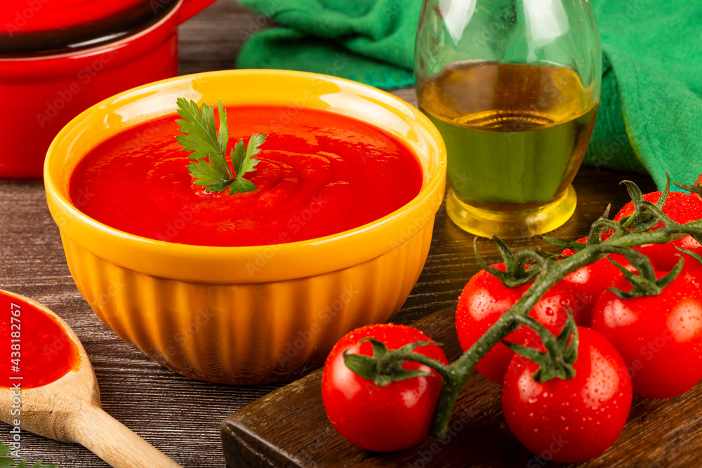 Delicious homemade tomato soup in bowl. Delicious homemade tomato soup in bowl.