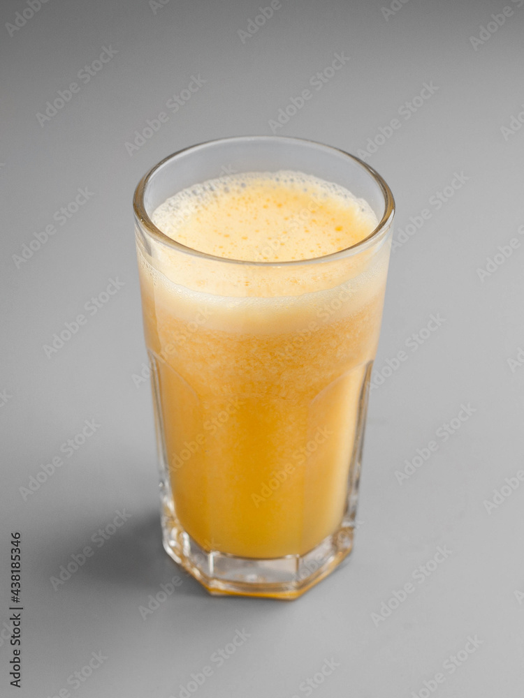 Delicious orange juice in a beautiful glass Delicious orange juice in a beautiful glass