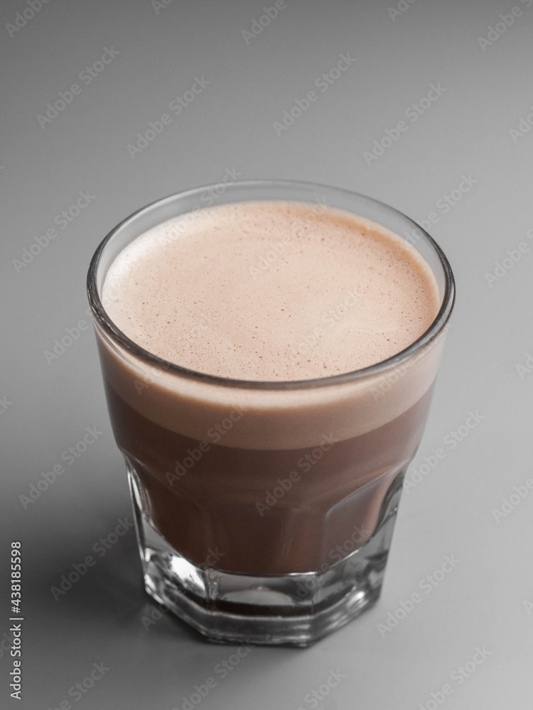 Delicious hot cocoa in a beautiful glass glass. Delicious hot cocoa in a beautiful glass glass.