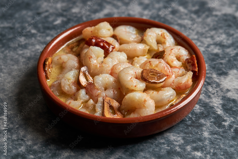 Appetizing spicy prawn dish in bowl in restaurant Appetizing spicy prawn dish in bowl in restaurant