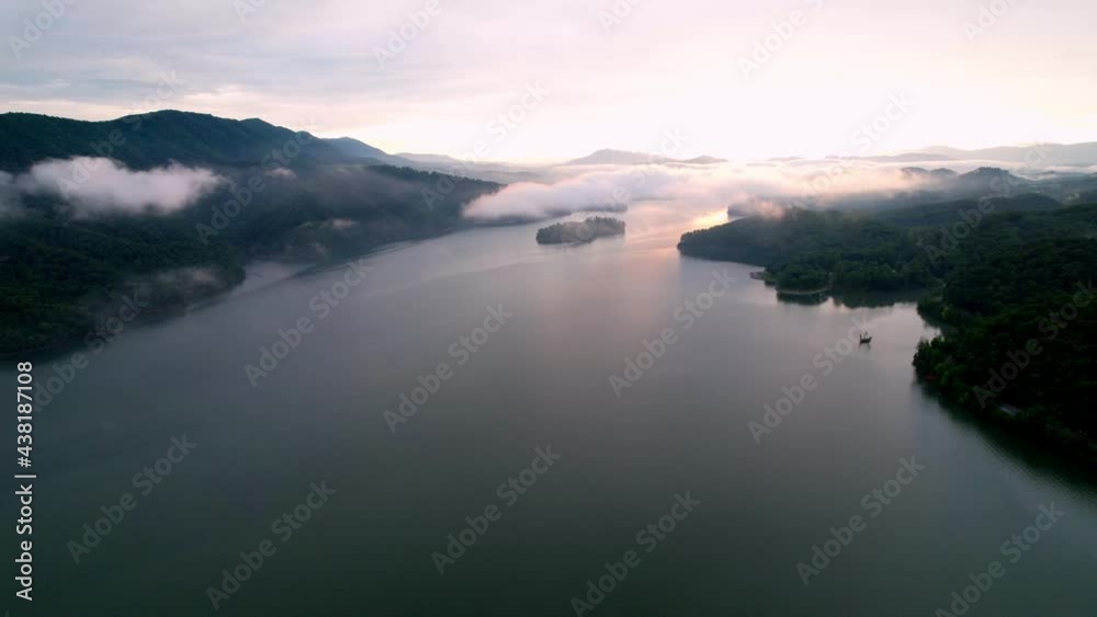 Sunrise and Clouds over Watauga Lake in East Tennessee Sunrise and Clouds over Watauga Lake in East Tennessee