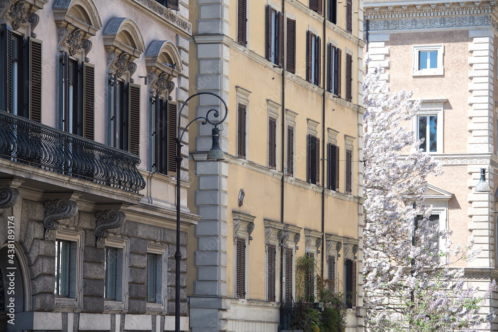 A close up of a street in front of a building in Rome Italy. High quality photo