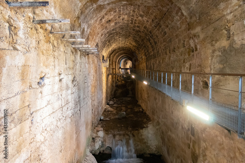 Vault of the cerezuelo river under the ruins of the church of Santa Maria, Cazorla, Jaen, Andalusia, Spain photo