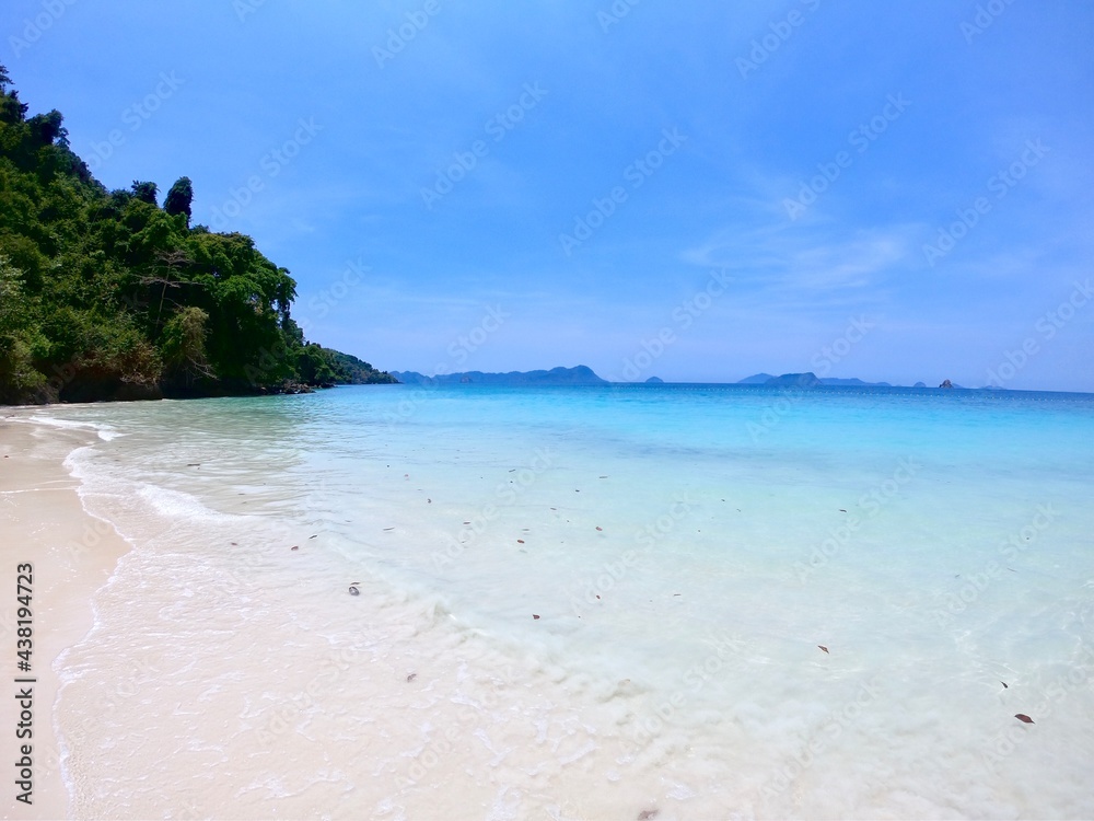 Tropical paradise beach of Nyaung Oo Phee islands on sunny day in Myanmar.