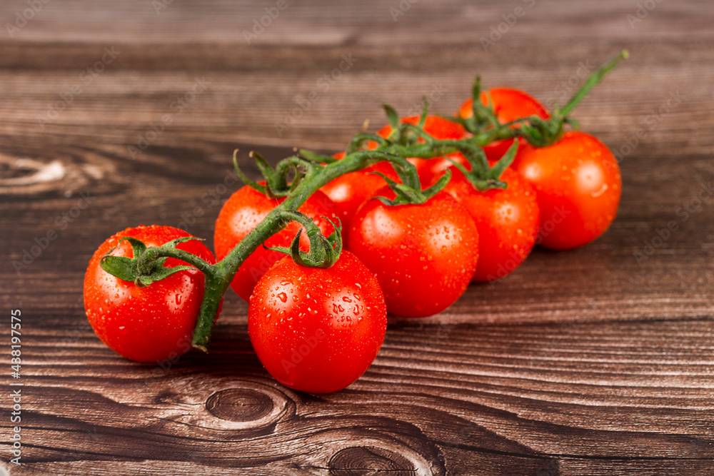 Ripe tomatoes on the wooden table. Ripe tomatoes on the wooden table.