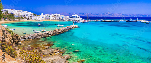 Greece holidays, Cyclades, Paros island beaches and sea. Scenic tranquil coastal village Piso Livadi with turquoise sea photo