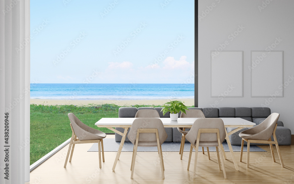 Dining table with chair set and sofa on wooden floor of dining room near living area in modern house or luxury hotel. Minimal home interior 3d rendering with sky and sea view.