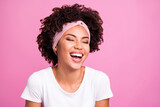 Photo of young happy cheerful smiling beautiful african girl laughing hear good joke isolated on pink color background