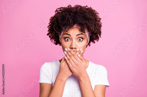 Photo of young shocked amazed surprised afro girl cover close mouth with hands having problem isolated on pink color background