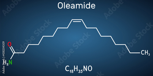 Oleamide molecule. It is fatty amide derived from oleic acid. Structural chemical on the dark blue background