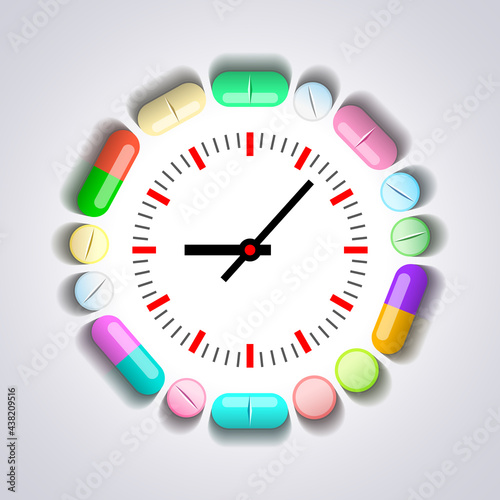 Clock and pills and tablets around it, healthcare and medical concept