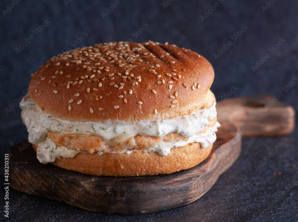 burger stuffed on a wooden stand burger stuffed on a wooden stand