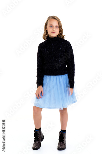 Pretty girl in umper and fluffy skirt photo