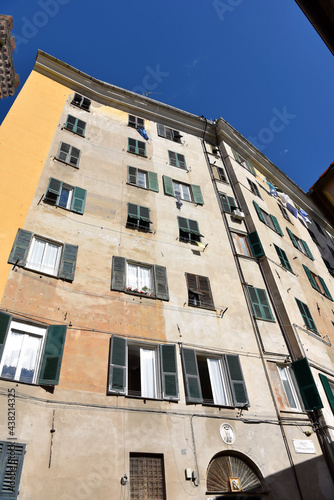 historic building next to the embriaci tower genoa italy photo