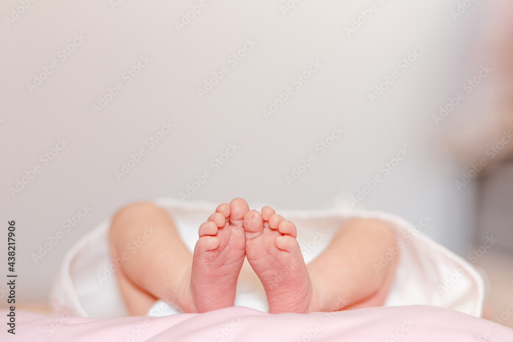 Newborn baby's little bare feet Newborn baby's little bare feet