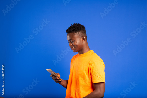 Young man receiving mobile money