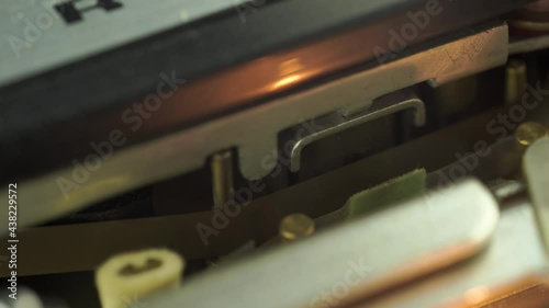 turning on old reel to reel tape recorder, close up macro shot