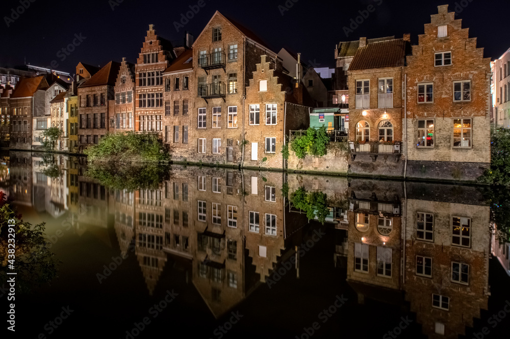 Ghent. Historic District Old houses are reflected in the water. East Flanders, Belgium