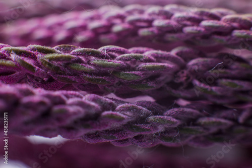 purple threads close up under the microscope background