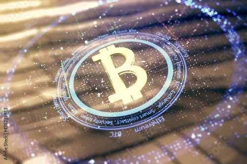 Double exposure of creative Bitcoin symbol hologram on blurry metal background. Cryptocurrency concept