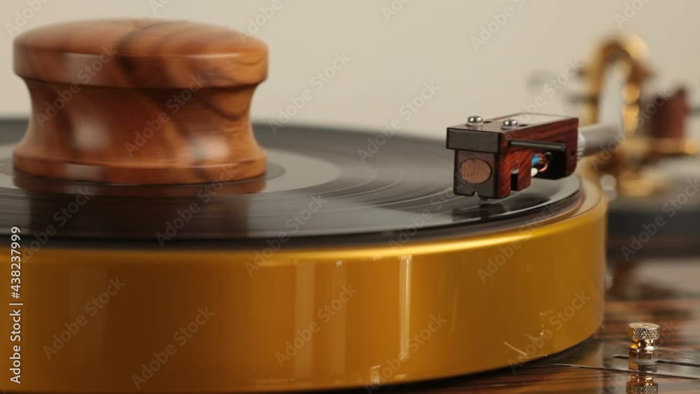 HI-FI  vintage turntable playing a vinyl record. Analogue sound music . White background
