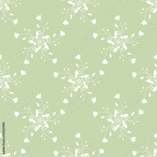 Seamless floral pattern with bouquets of wildflower. Blooming branches of bluebell flowers. Campanula or bellflower. White silhouettes on light green background.