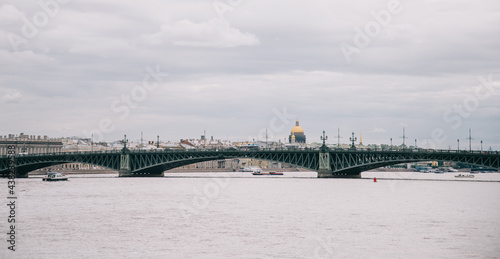 City landscape of Trinity Bridge. In the background is the dome of St. Isaac's Cathedral. © Alex Photo