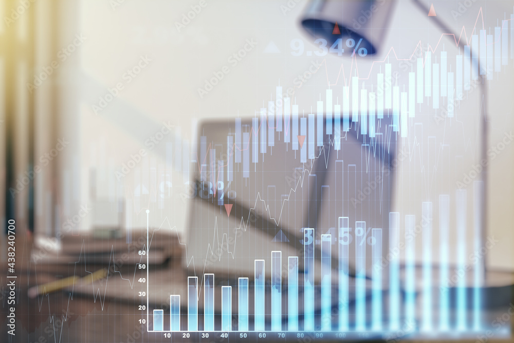 Double exposure of abstract creative financial diagram on modern laptop background, banking and accounting concept Double exposure of abstract creative financial diagram on modern laptop background, banking and accounting concept