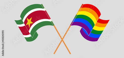 Crossed and waving flags of Suriname and LGBTQ
