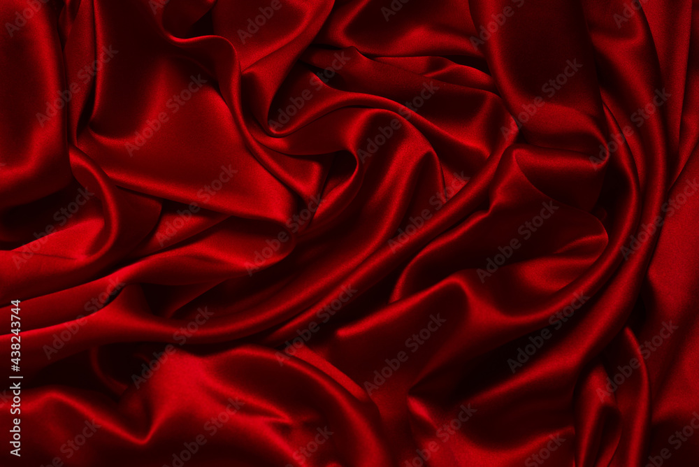 Red silk or satin luxury fabric texture can use as abstract background. Red silk or satin luxury fabric texture can use as abstract background.