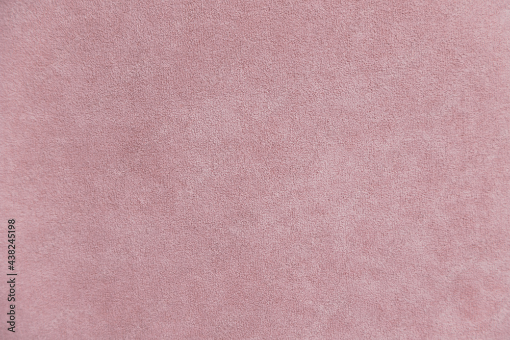 Background with pink velours texture, close-up